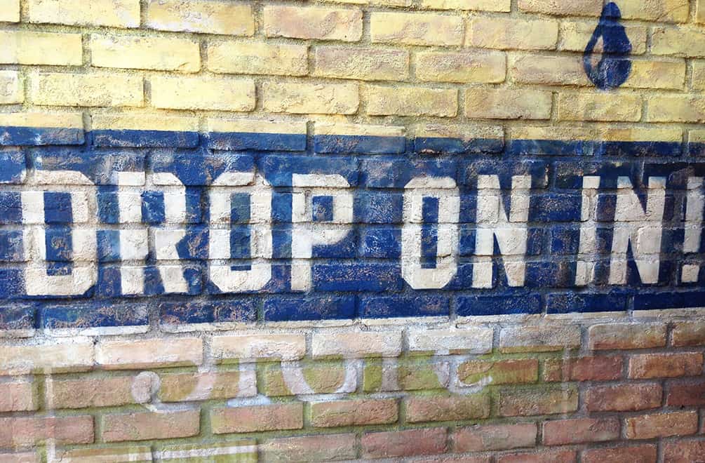 The "Drop In" painted wall sign at Radiator Springs in California Adventure.