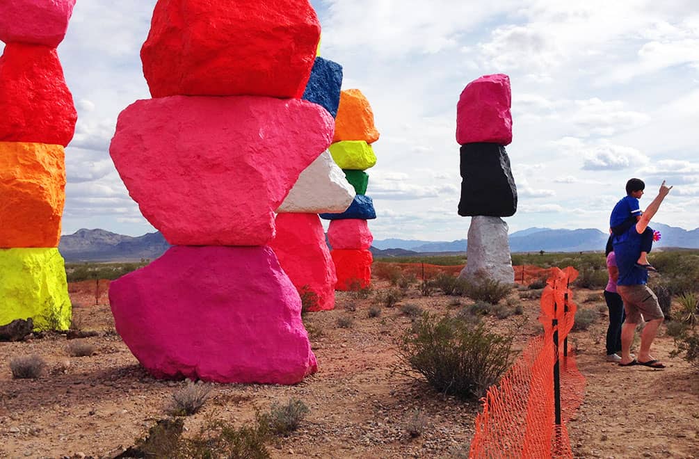 Family in front of Seven Magic Mountains