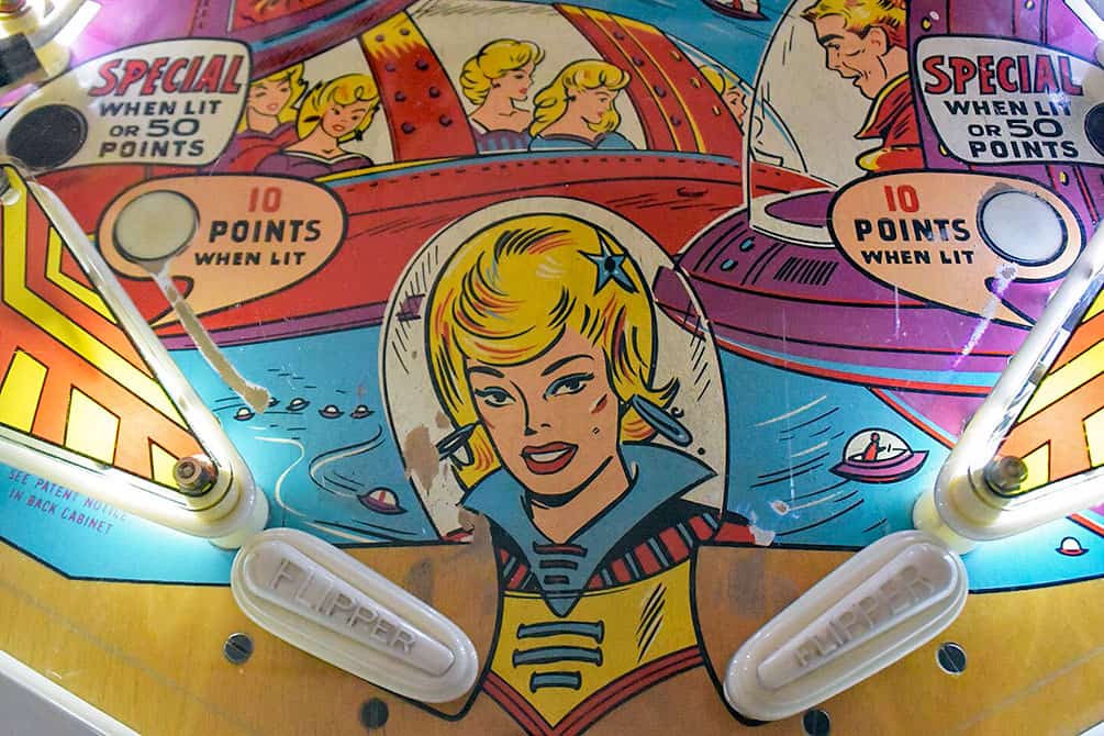 Illustration of woman on pinball machine at Pinball Hall of Fame, Las Vegas