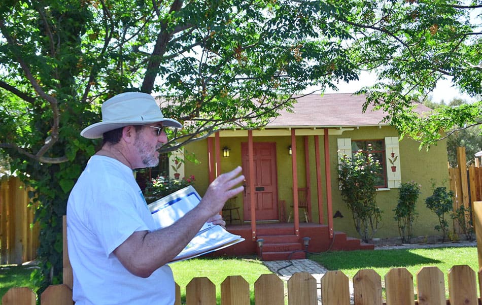 Tour guide John S. Park walking tour